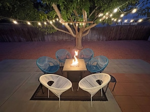 Relax outside around the fire pit, grill or play a game of corn hole.