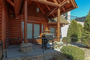 front porch with swing and grill