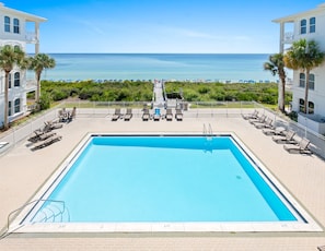 Community pool beneath porch.