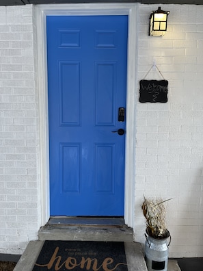 Separate entrance under carport.