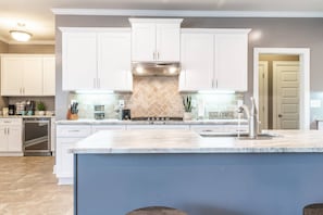Everything is right where you need it. Chill your favorite wines in the full size wine cooler in case you'd like a night cap.
