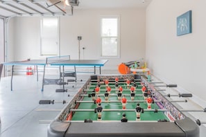 These little guys in the foosball table look pretty serious. Challenge Accepted!