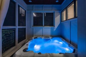 Relax and unwind in our luxurious hot tub, the perfect spot to soak away your stress and enjoy the serene surroundings.