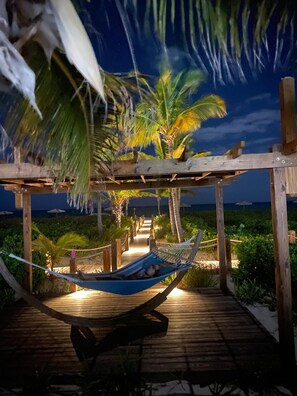 Hammock on boardwalk from private balcony. 