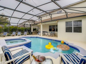 100” projector screen, Professional BBQ, Screened in pool and spa area. 