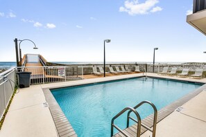 Soak up the sun or cool off in the beachfront pool just steps away.