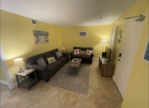 Spacious living room to relax after a day at the pool or beach. 