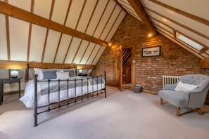 The Cart Shed, North Creake:  A very comfortable master bedroom with super-king bed