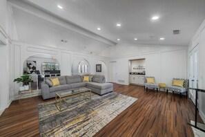 Spacious living room with coffee bar! 