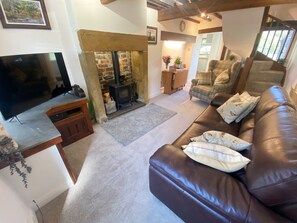 Cosy lounge with full Sky Q package & log burner
