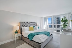 Master bedroom, king bed, Roku tv, balcony access, closet, private bathroom