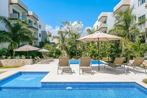 Grab a chair at the pool and relax the day away!