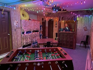 New for 2023!  The garage has been converted to a TIKI BAR and Game Room.  