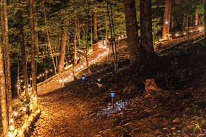 The walkways are lit at night to provide for safe walking to and from the tent.