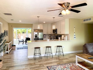 Entry looking to Kitchen and Screen porch