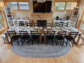 Gather and feast: Our spacious 16-seat dining table welcomes large families. 