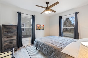 Second bedroom with queen mattress and 32" Roku TV.