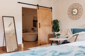 Indulging in stolen moments of luxury and love as we peer into our sumptuous bathroom, where opulence and romance intertwine in perfect harmony.