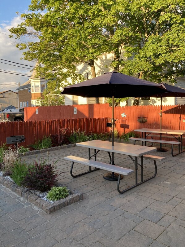 Patio with picnic tables, grills 