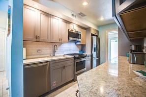 Prepare the perfect dinner with ease, thanks to the abundance of counter space available in the kitchen.