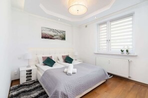 Comfortable double bed in the bedroom. 