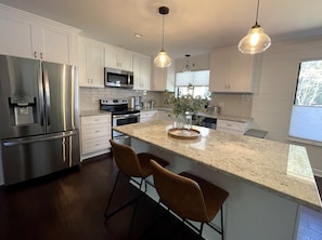 Kitchen stocked with basics.