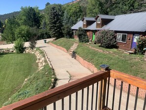 View of house with private driveway