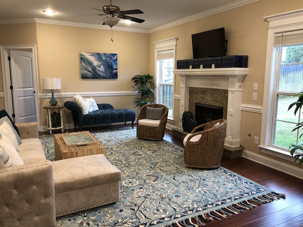 Living Room with Gas Fireplace; Great sunset views from here!