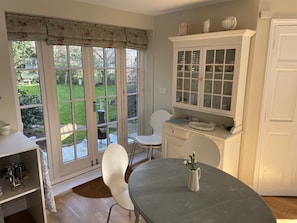 Eating area looking out to the patio and garden 