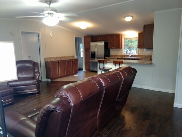Relax in the spacious living room after a day of hiking, biking, or kayaking.