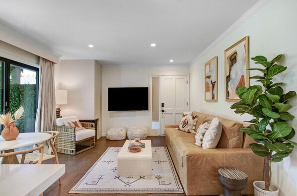 Experience the convenience of the open-concept plan where living room, dining area, and kitchen are close together.
