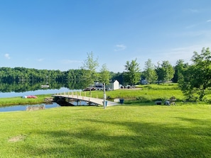 View of bridge leading to the beach and fire pit