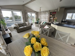 Open plan living dining room overlooking the countryside.