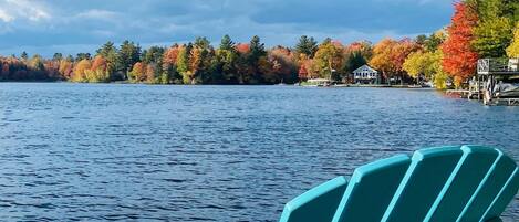 Private dock with 2 Adirondack chairs. 