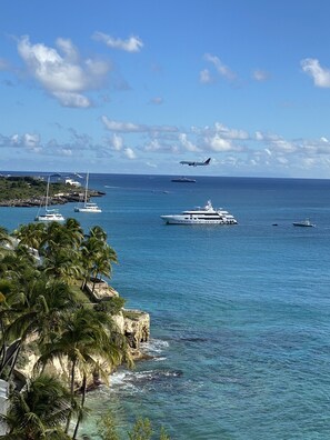 Watch the planes land and yachts cruise from your multiple balconies.