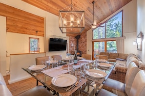 Enjoy a formal dinner for 8 at the large dining table that looks over living rm.