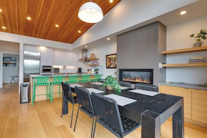 Dining Room with 6 seats and 5 seats at kitchen counter bar.