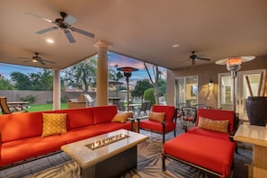 Patio 1 w/ 65in HD TV, fire table, heaters, Wolf BBQ & outdoor kitchen