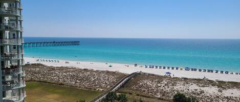 Beautiful view from the balcony looking south to the Gulf and over the pool.