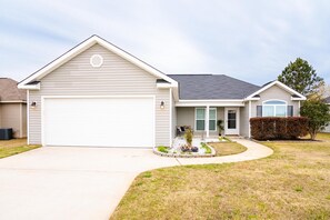 House Front w/2 car garage & front seating