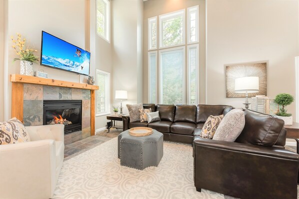 Family room with fireplace in Union Woods home