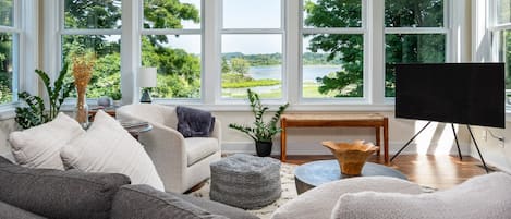 Sun room with stunning year-round views