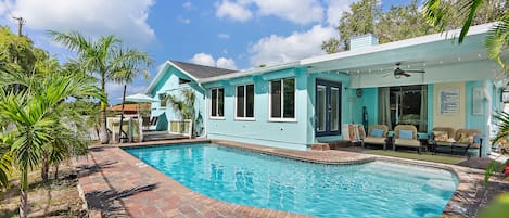 Relax in the Florida sunshine by a beautiful pool.