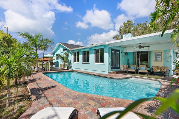 Relax in the Florida sunshine by a beautiful pool.