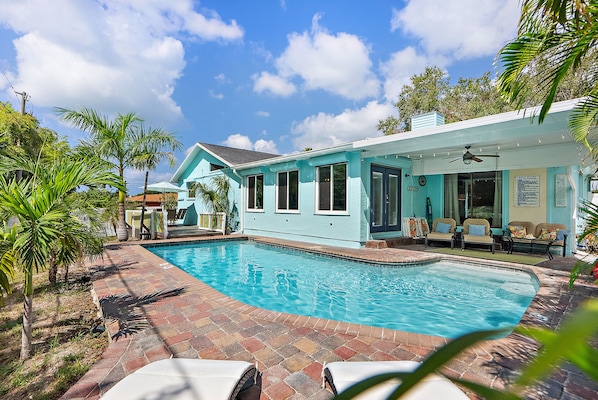 Relax in the Florida sunshine by a beautiful pool.