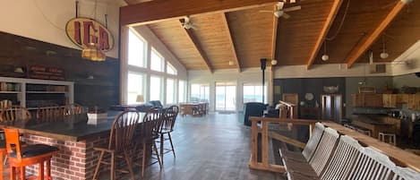 18 foot vaulted ceilings in our Great Room with windows showing Lake Michigan.