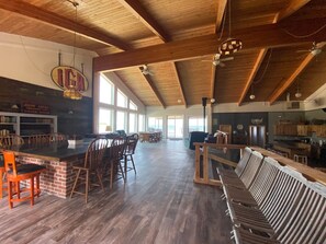 18 foot vaulted ceilings in our Great Room with windows showing Lake Michigan.