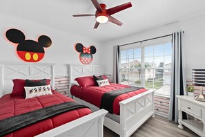 Mickey and Minnie bedroom with 1 full and 1 twin bed.