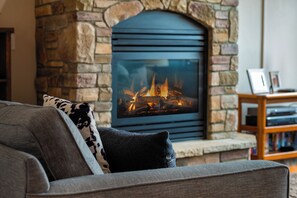 Curl up with a good book next to the gas fireplace in the living room.