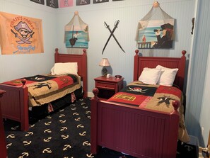 Your fourth bedroom has two cozy twin beds with an adorable pirate theme!